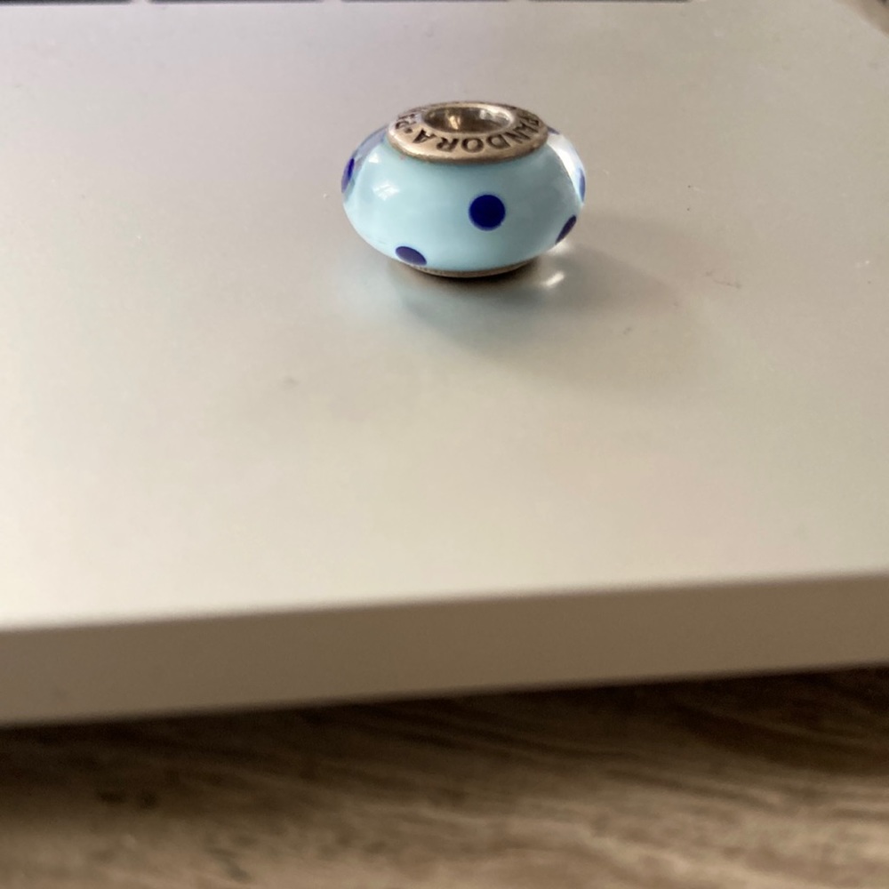Pandora Sterling Silver Light Blue with Dark Blue Polka dot Glass charm.